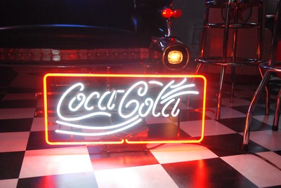 Neon &quot; Coca-Cola&quot; in frame 220v