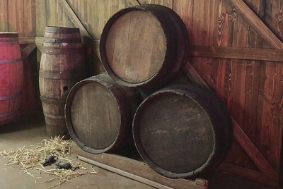 Pile of three Wooden Wine Barrels